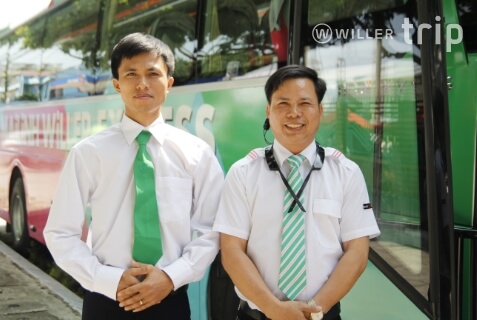 Mai Linh WILLER driver and attendant waiting to greet customers, following the Japanese customer service style